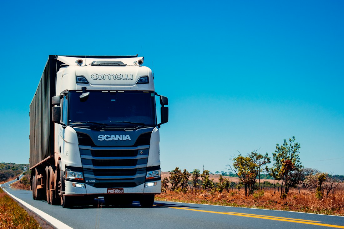 Freight truck traveling along a highway